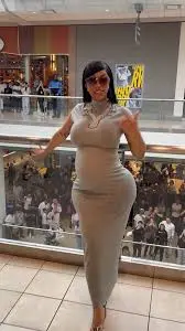 cardi in a braless top