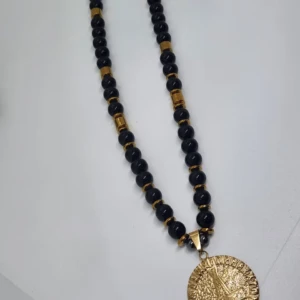 black beaded necklace with Gold Pendant